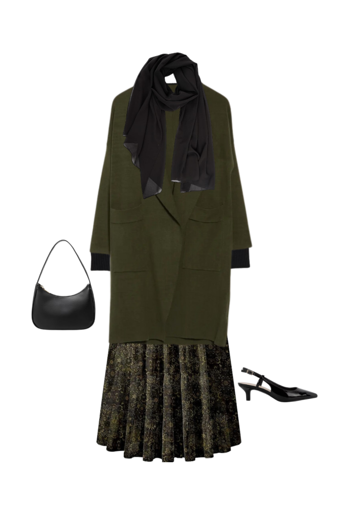 a dark green and black flower patterned skirt with low slingback heels and a black shoulder bag and a dark green long coat and a black hijab