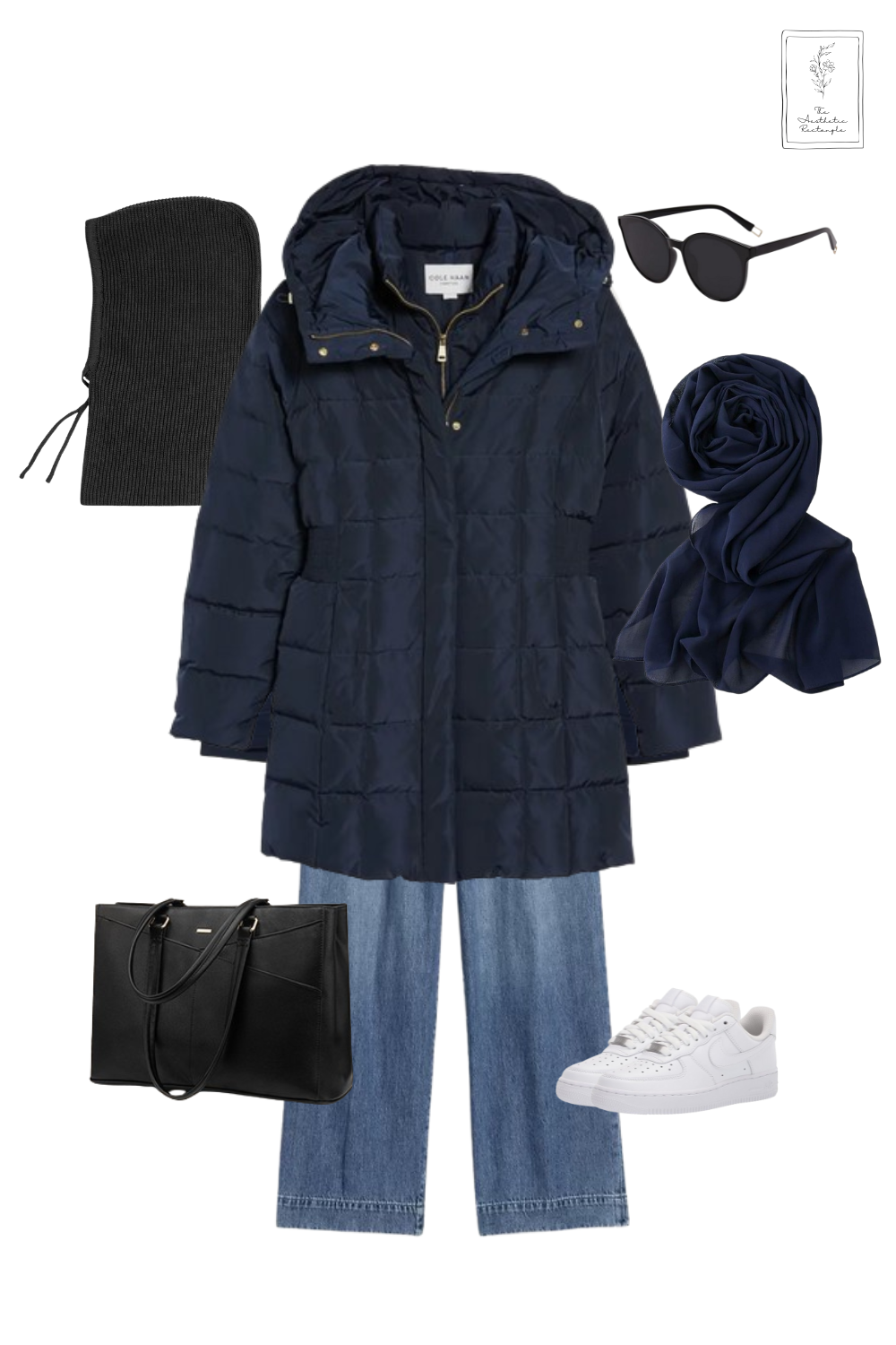 A casual winter outfit featuring a navy blue puffer coat layered over a white button-down shirt and a navy V-neck sweater. The look includes wide-leg blue jeans, white sneakers, and a navy chiffon hijab. Accessories include a black beanie, black sunglasses, and a sleek black tote bag for a modern and functional style.