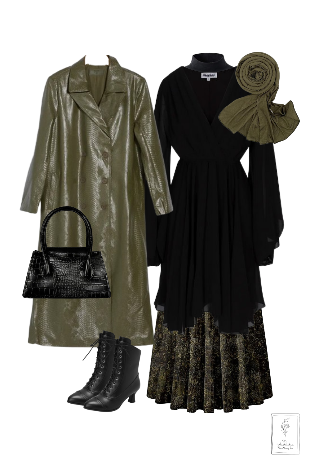 A chic and modest outfit featuring a black long-sleeve wrap dress layered over a black and gold floral maxi skirt. The ensemble is paired with an olive green faux crocodile trench coat and a matching olive green hijab. Accessories include a structured black croc-embossed handbag and black Victorian-style lace-up boots with a low heel. A small logo in the bottom right corner reads "The Subtle Chic Wardrobe."